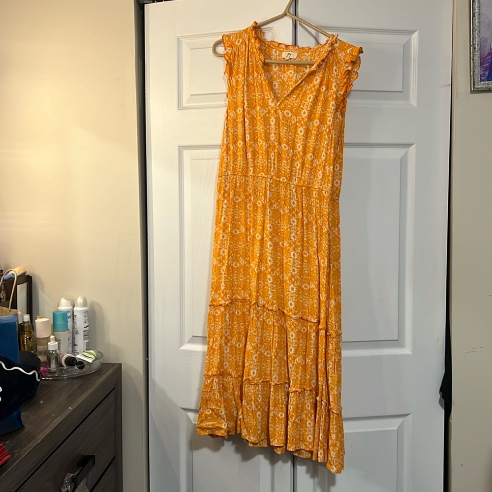 This L sleeveless dress in orange by Ivey on sale.
